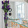 Lila Vanda Orchids and Driftwood in a Conical Glass Cylinder