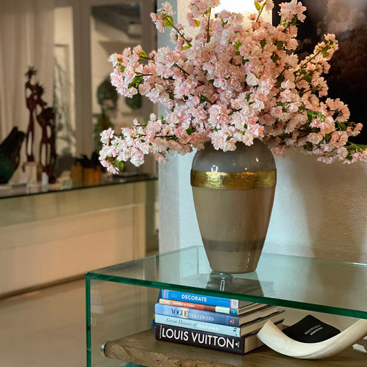 "Goddess" vase with pink cherry blossoms