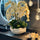 White Phalaenopsis Orchids in Vase with Sculpture 